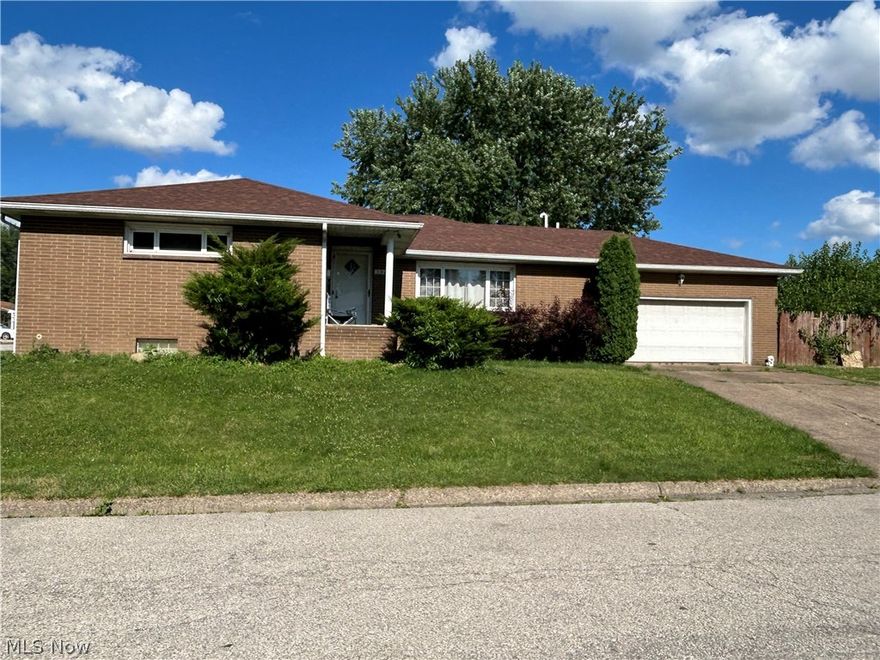 3 Bedroom 2 bath Brick Ranch situated on a beautiful corner lot! Home is located in a quiet neighborhood near schools, close to shopping, and easy access to the interstate. Recently installed new furnace and A/C (2024), new 200 amp electric panel (2024), newer hot water tank (2022), and newer roof (2019-2020). Home boasts lovely wood flooring throughout and spacious bedrooms. Kitchen has extra cabinetry storage under breakfast nook area and walks out to a roomy 2 car garage. Set up a showing today to make this Ranch home yours!