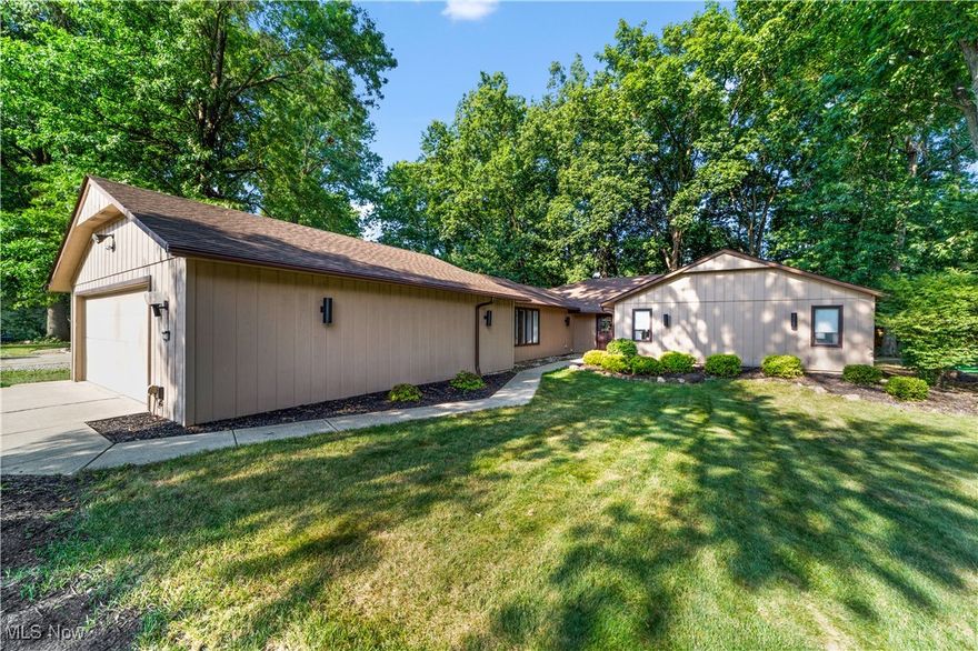 Welcome to 9598 Pebble Brook Lane, in the desirable Meadowood community. This expansive ranch with over 2500 square feet  offers a layout designed for both comfort and entertaining. Inside, you’ll find two generous 24x20 living spaces, one featuring a wood-burning fireplace and wet bar, creating the perfect spot for gatherings. The kitchen is highlighted by a granite breakfast bar that opens into the living area, keeping the flow easy and inviting.

The dining room extends naturally to the back patio, where you can enjoy views of the private backyard and wooded surroundings. The primary suite provides its own full bath and a wall of thoughtfully designed closet space. Two additional bedrooms with double closets share a stylish full bath. A spacious laundry area and bonus room—ideal for a fitness space, hobby room, or extra storage—round out the interior.

Living in Meadowood also means access to community amenities including a pool, playground, tennis and pickleball courts, and basketball courts.