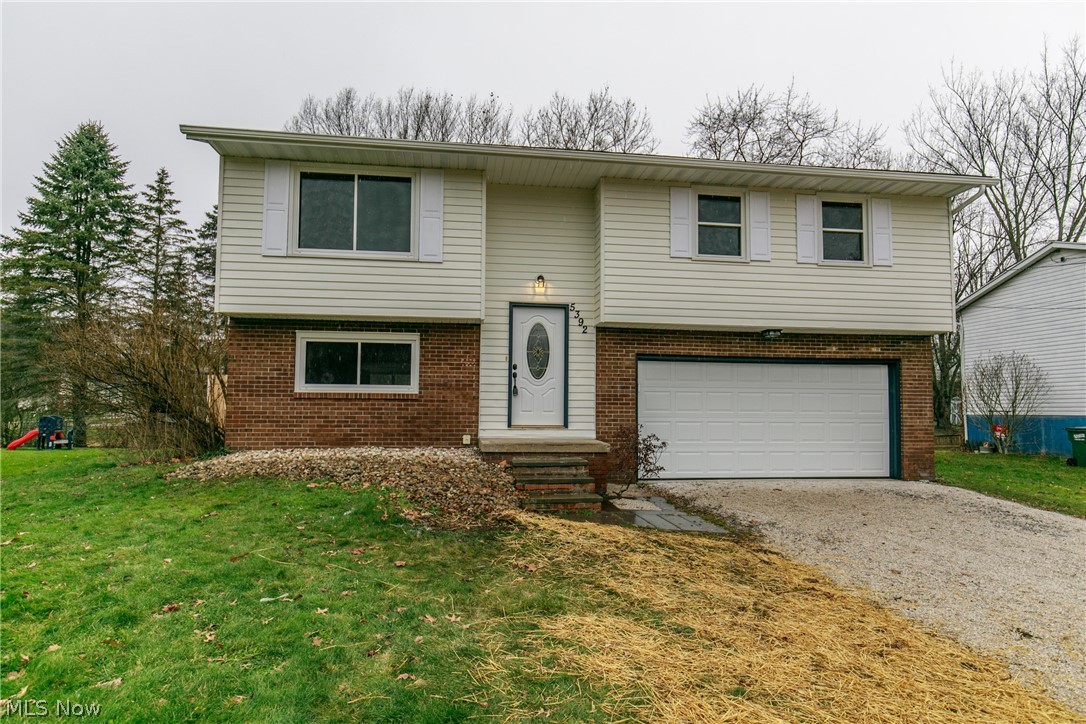 This gorgeous bi-level located in Stow is ready for you to move in! Many updates throughout including: new kitchen cabinets, granite counter tops, and stainless steel appliances. All new flooring throughout along with fresh paint. Updated bathrooms with new fixtures and tiled shower. New roof and shutters.
