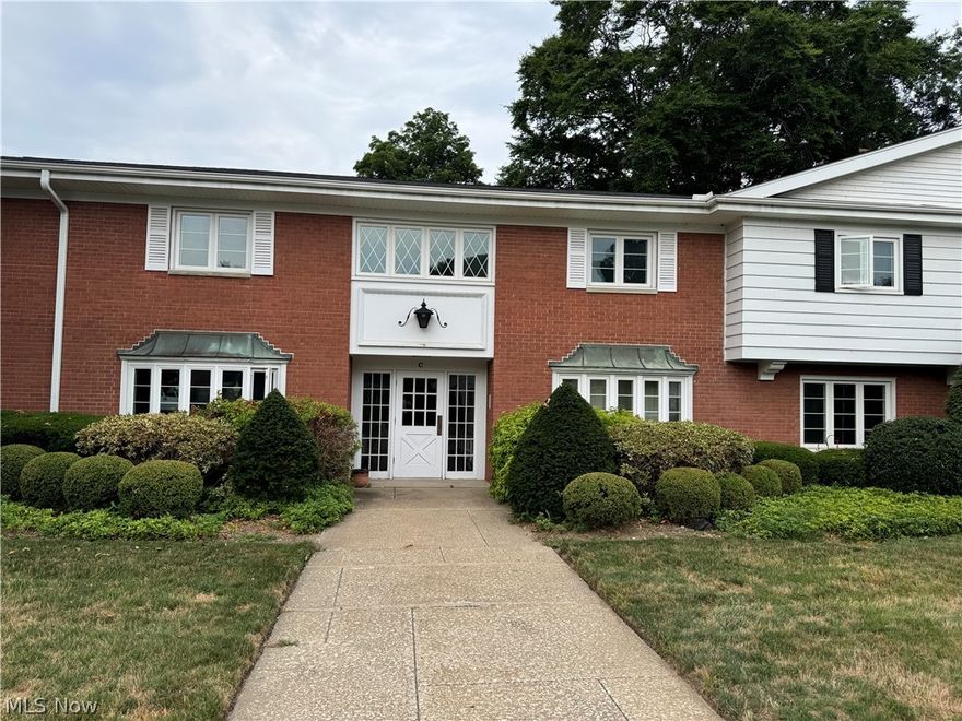 Welcome to this ready to move in Condo located in the desirable Hollycroft Park Condominiums of Hollycroft Lane. Featuring a private view of the rear landscape, you will love the location and enjoy the access to nearby Garfield Park. All appliances in the kitchen will stay and there are plenty of cabinets, counter space, a pantry closet and vinyl flooring for easy maintenance. Enter the home from the main Foyer and take in the spacious living room with wood burning fireplace and views of the rear yard.  This connects to the dining room and kitchen as well as a first-floor half bath for your convenience. Very comfortable feeling with plenty of space for entertaining family and friends! Upstairs, you will appreciate the 3 nice size bedrooms with generous closet space and an updated full bath with ceramic tile. The 1st floor laundry is next to the unit off the hallway which also houses the furnace and hot water tank. Windows were replaced by owner about 5 years ago and the roof on the building was completed in 2021. There is also additional insulation in the attic. A parking garage is assigned to the owner as well as an additional space if needed. This property is very clean and well maintained so set up a viewing today.