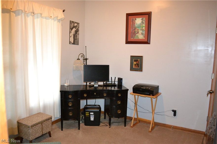 Beautiful move-in ready home in a peaceful setting within the desirable Mapleton School District, offering the best of country living with city water. This 3-bedroom, 2-bath home features cathedral ceilings through the main living area, creating a bright and open feel. Recent updates include new flooring (2024), new sliding doors (2024), new heat exchanger (2025) and newer hot water tank. The lower level offers 9-ft ceilings with poured concrete walls and includes a transferable waterproofing warranty with approximately 12.5 years remaining. The main level is plumbed for a washer and dryer, while the basement is already plumbed for a bathroom with a grinder pump installed, as well as a wet bar—offering great potential for additional living or entertaining space. Home includes accessibility features for mobility needs. Enjoy outdoor living on the deck and the convenience of a newer 12x14 shed. Custom blinds throughout complete this well-maintained home ready for its next owner.