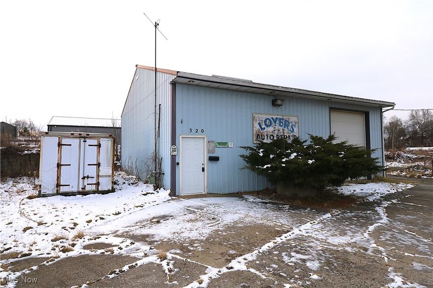 Exceptional opportunity...calling all contractors, mechanics, landscapers, hobbyists, car collectors, and investors. This versatile shop features two car lifts, air compressor, ample equipment storage, and generous on-site parking. The property includes two overhead doors 10' x 12' and 8' x 10' allowing for flexible access and functionality. Suitable for a variety of commercial uses, the building offers strong potential for revitalization and customization. With a need for some tender loving care, this shop promises the perfect canvas for your professional vision. Seize this outstanding chance to expand, relocate, or start your business! Take advantage of its prime location in the heard of Norwalk and limitless potential to establish a successful and lucrative venture.