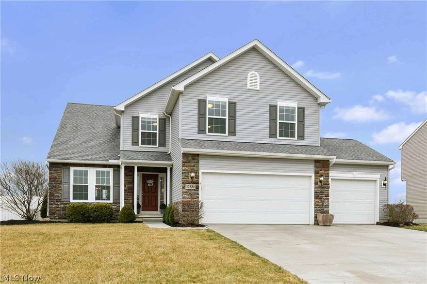 Prepare to be Moved!..Into this North Ridgeville Colonial, in the desirable Cypress Station community. CLICK ON VIRTUAL TOUR LINK! This spacious home has a neutral color palette - move-in and decorate! So many details in this home incl. board and batten trim, vaulted ceilings, recessed lighting, and upgraded finishes. Prof. landscaping and wide driveway with 3 car garage give this home great curb appeal. Step inside and appreciate the hand-scraped hardwood floors that contrast against the bright white trim. An office off the foyer has doors for privacy. This home's open floor plan is perfect for entertaining and everyday family living. Cooking is a delight in this kitchen with s/s appliances, quartz counters, and tile backsplash. Lots of counter space and cabinets mean no shortage of prep and storage space. Windows and french doors flood the space with natural light. Enjoy a fire in the stone fireplace from the great room or adjoining dining area. First-floor master bedroom with a spac