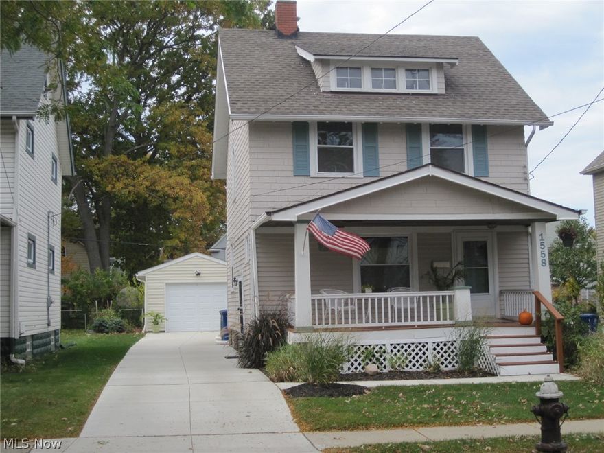 Charming 3 bedroom 2 1/2 bath Lakewood colonial is move-in ready.  Arched door frames, hardwood floors, wood trim, crown molding and built-ins throughout.  Updates include new 1 1/2 car detached garage with electric opener (2014), new cement driveway and sidewalk (2014), new hot water tank (2012), new exterior doors and vinyl windows (2007), new roof (2006), new furnace and central air (2006), floating deck with mature landscaping in back yard and more.  Well cared for home with neutral decor.  All appliances stay.  Finished 3rd floor space can be used as a rec room or additional bedroom.