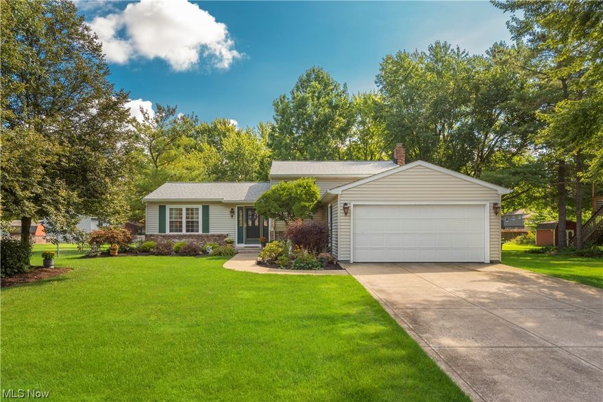You don't want to miss this immaculately maintained home! As you enter this 1776+ sqft home, you can't miss the brand new Lux Vinyl Plank flooring throughout the main floor. And the kitchen has been opened up to view the entire level! Fresh neutral paint, solid wood cabinets, and stainless appliances round out the amenities on this level. As you head downstairs you can't help but notice the 24 x 24 living space that includes an amazing fireplace and woodworking. The fireplace has been converted to a gas blower with remote and thermostat, that can heat the home, if needed! Step down to the basement area with an office, laundry/utility room, and storage space! Then upstairs is the master with a large walk-in closet, and 2 additional nice sized bedrooms. All bedrooms have ceiling fans. The main bath has been updated with Quartz countertop, new faucet, toilet, and ceramic tile on floor and in the shower! All the doors have been replaced with 6 panel, solid doors, and the entire home has been refurbished with custom wood trim. Step outside to the deck and patio area that overlook the parklike back yard. The exterior of the home has been completely up dated as well: gutters(with screens) and downspouts (19), deck stained and refinished, new handrails and stairs (22), professionally landscaped (22), Roof (19), windows have 3 more yrs on their transferable warranty! If you are looking for true quality in your next home, this is a must see!!