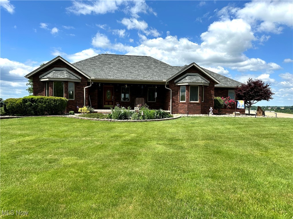 Welcome to your own private retreat on 16.1 acres of stunning property in East Muskingum School District. This spacious 4 bedroom, 3.5 bathroom home features a cedar lined vault room with a Fort Knox door for added security and peace of mind. The open concept living area boasts vaulted ceilings, creating a bright and airy atmosphere. Step outside onto the large outdoor patio complete with a fire pit, perfect for entertaining friends and family year-round. Plus, never worry about losing power with the generac whole house generator ensuring you always have electricity. This property also boasts a spacious 3 car garage with a convenient half bath and separate HVAC system, perfect for all your storage needs. The bonus room above the garage offers endless possibilities for a home office, game room, or extra bedroom.
Step inside to find a large family room downstairs, ideal for gathering with loved ones or cozying up by one of the two natural gas/wood burning fireplaces on chilly evenings. With tons of storage throughout the house, you'll have plenty of space to keep your belongings organized and clutter-free. Don't miss out on this unique property that offers both luxury and privacy in one beautiful package. All mineral rights included