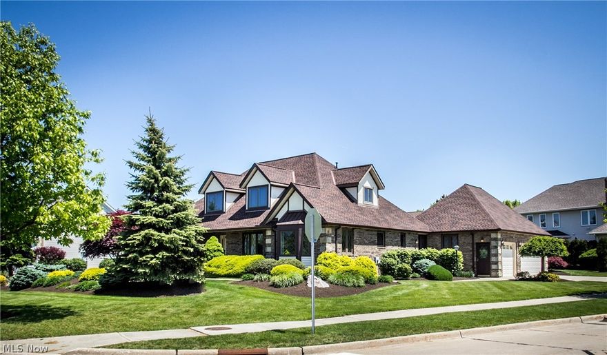 Custom Built Tudor Colonial in Beautiful Aberdeen Subdivision.... This home is a dream for golf lovers.....Conveniently placed in front of the 1st hole fairway at Stonewater Golf Course. Homeowners will love the bike path across the street. Maintenance fee includes all common ground landscaping, community room, pool and tennis courts. This stunning home features a First Level Master Bedroom Suite, remarkable Great Room, 2 Fireplaces, Private Den, Kitchen offers new appliances and granite counter tops and much more. The excellent curb appeal and amazing roof lines bring a tasteful combination of brick and stone. This immaculately landscaped home includes a 1-year warranty with HMS warranty company. The neutral decor and detailed tile work on the first floor are amazing. Pet free home is meticulously maintained inside and out and was kept in brand new condition. The future owner will enjoy 2 separate furnaces and air conditioners for comfortable cooling and heating. The basement is spaci