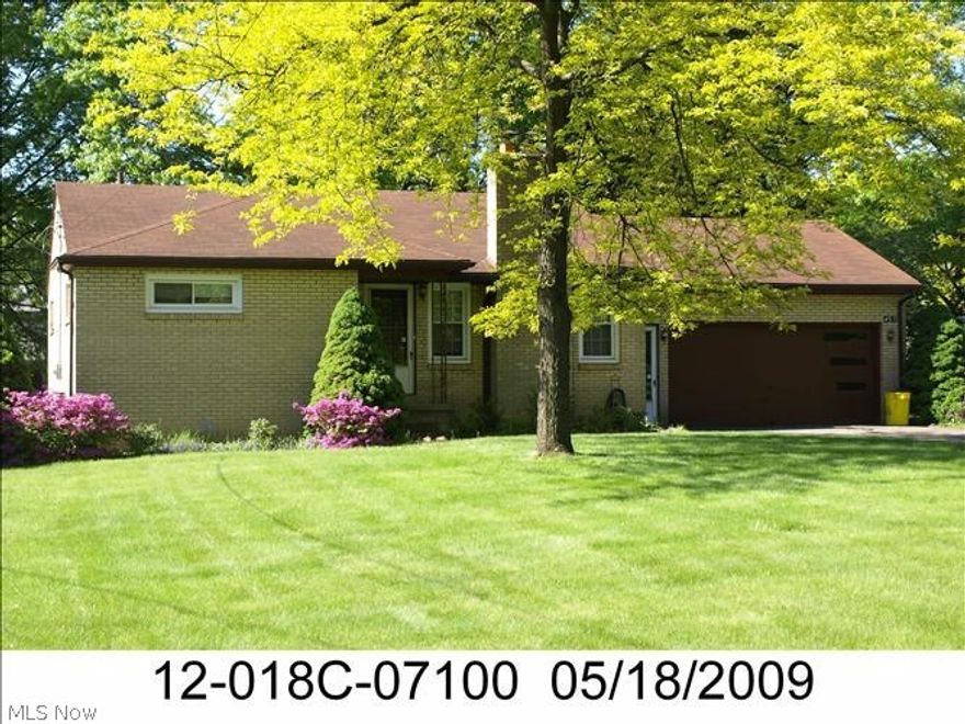 All brick Ranch on a deep, 220 ft., treed lot. Concrete driveway. Double, attached garage. Roofed, rear enclosed porch. Two large BR's, 2 full BA's. Hardwood floors. LR w/fireplace. Formal DR. Eat-in Kitchen w/stained wood, custom cabinets, pantry closet. Vinyl windows. Rec room in basement w/fireplace. Full bath in basement. Immediate occupancy. PRICED TO SELL QUICKLY! CALL TODAY!