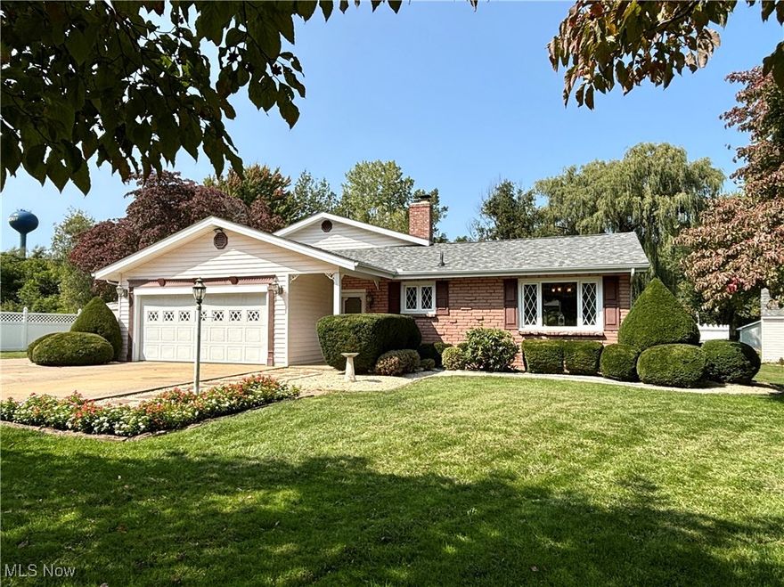 Introducing 548 Creek Road - This one-owner home has great curb appeal with a partial brick front exterior, mature landscaping and darling details. You are welcomed in through a front entry with adjacent built-in storage that leads to the attached garage. The living room features a large sliding glass door that overlooks an expansive deck with views of the backyard and pool. The kitchen offers wood cabinets, ample counter space, movable kitchen island, stainless steel appliances and space for dining. The main living space is finished with crown molding and ornamental corbels. A few steps up from the living room leads you to 3 bright bedrooms with hardwood floors and full bathroom. A few steps down brings you to a large family room with fireplace and pool table. There is also laundry room and bathroom with walk out access to the exterior. A utility closet leads to a large crawl space for extra storage. Opportunities for entertaining continue out on the back deck, made of low-maintenance composite decking and featuring a pergola for shade. The crown jewel of the backyard is a large in-ground pool with deep end, slide and diving board. The pool is surrounded by a fenced-in brick patio for enjoying the outdoors with family and friends. Situated on .69 acres, the property is partially fenced, offers extra parking, a basketball hoop and 2 sheds. The state-designated Wild and Scenic Conneaut Creek with its historic Conneaut Creek Covered Bridge, metropark hiking trails and the Conneaut Creek Wine Trail are less than 1 mile down the road. This location also offers access to local highways for easy travel around the region. This charming property is available to the market for the first time, schedule your private showing today!