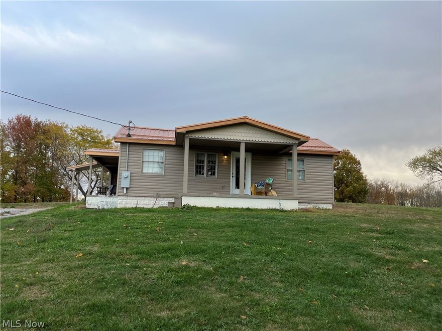 This single story home was gutted & completely remodeled (kitchen, living room, 2 bedrooms & a full bath with laundry set-up).  Situated on a scenic 2.2 acre lot that is one of the highest points in Jefferson County.  Property could be split for a new home in back yard.  Detached 24 X 24 garage (new vinyl & stone exterior & copper roof).  There is a covered lean-to patio off garage.  Sit in the shade & watch over the above ground pool.  Just minutes to St Rt 7 & St Rt 22.  Mineral rights are reserved by the seller.