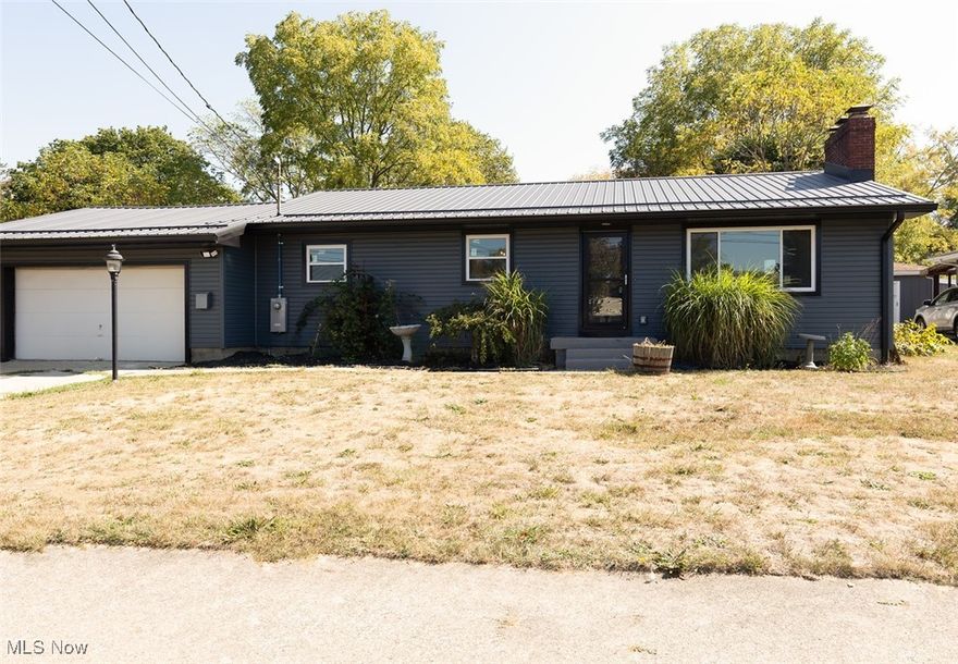 Welcome to this gorgeous rebuilt ranch-style home. This home offer three spacious bedrooms and two full bathrooms. The open kitchen brings in a lot of natural lighting from the brand new vinyl windows. The kitchen is equip with butcher block countertops, new cabinets and brand new appliances. As you make your way down the hallway you will meet a newly renovated bathroom with a double vanity sink and new shower. The basement is an open canvas for you to upgrade and finish to your liking. The exterior offers 3 lots that near a half an acre. Brand new vinyl siding covers the exterior of the home along with brand new metal roof. Schedule your private showing today!