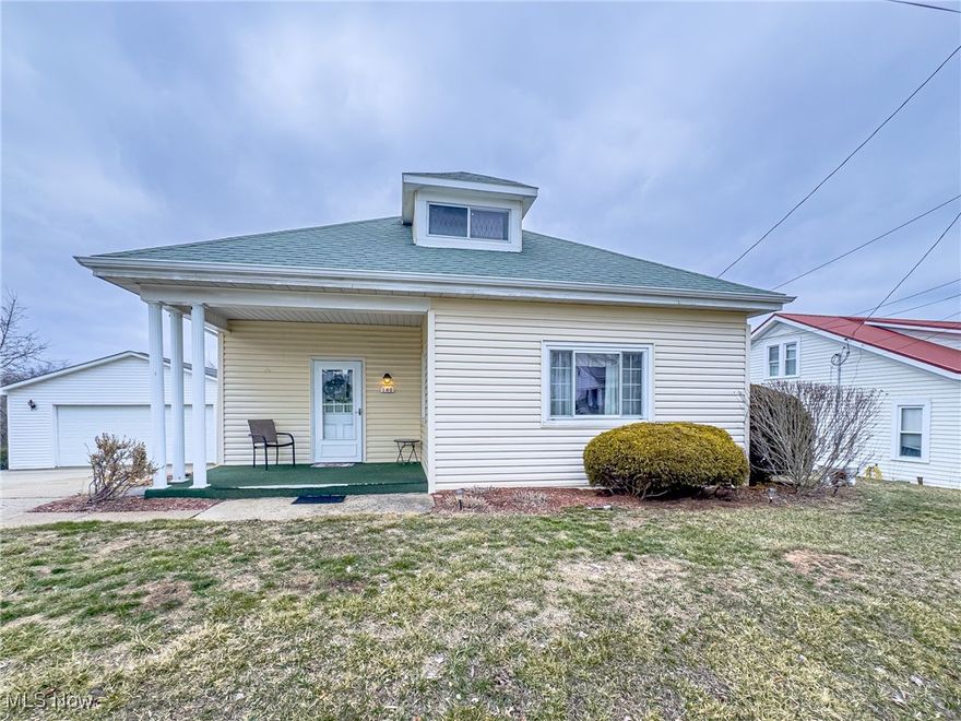 Welcome to 140 W Steubenville St! This charming 2-bedroom, 1-bath home sits on 1.33 acres and is conveniently located just minutes from Route 22. Step inside to find a warm and inviting living space filled with natural light. The spacious main-floor bedroom offers easy accessibility, while the upstairs bedroom provides a cozy retreat. Both bedrooms also feature lots of closet space. The home includes both a good-sized dining room and an eat-in kitchen, giving you plenty of space for meals and entertaining. All appliances are included, even the washer and dryer! Enjoy the convenience of a walkout basement, offering additional storage and easy outdoor access. Outside, relax on the spacious back deck while taking in the beautiful sunset views over your expansive yard. The large, detached 2-car garage provides ample space for vehicles, tools, and extra storage. Whether you're looking for a starter home, downsizing, or an investment opportunity, this property is full of potential. Don’t miss your chance to own this adorable and affordable home—schedule your showing today!