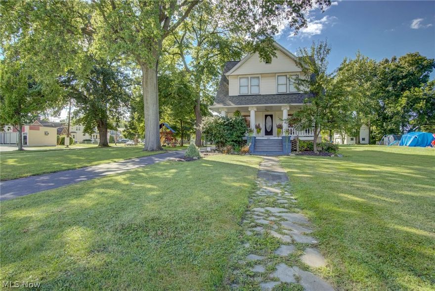 Beautiful Dutch Colonial situated on double wide lot! Expansive open porch welcomes you! Roomy interior boasts the perfect mix of old world charm and modern convenience. Architectural details include natural oak woodwork, pillars, dining room window seat, oversized windows and cove ceilings. Convenient 1st floor bath, remodeled 2nd floor bath with jet tub and lower level bath with jetted vertical spa! Gorgeous kitchen features loads of counter space, cherry cabinets with beveled glass doors, granite center island with JennAir cooktop, wine refrigerator and ample lighting! All 3 spacious bedrooms include ceiling fans; 4th room could be office or bedroom. The basement was waterproofed in 2002. L-shape driveway entrance off Rocky River Drive and Larchwood. Large Heartland storage shed. Welcome Home!