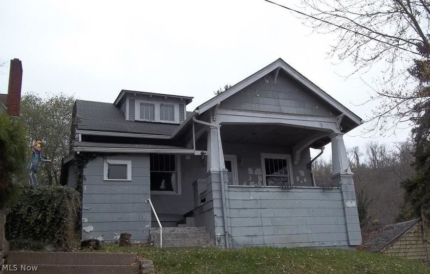 Four bedrooms, 2 bath home in need of some TLC.  Two bedrooms on main level & 2 bedrooms up.  Formal dining area & nice sized kitchen.  Property is selling "AS IS", "WHERE IS" with no warranties expressed or implied.