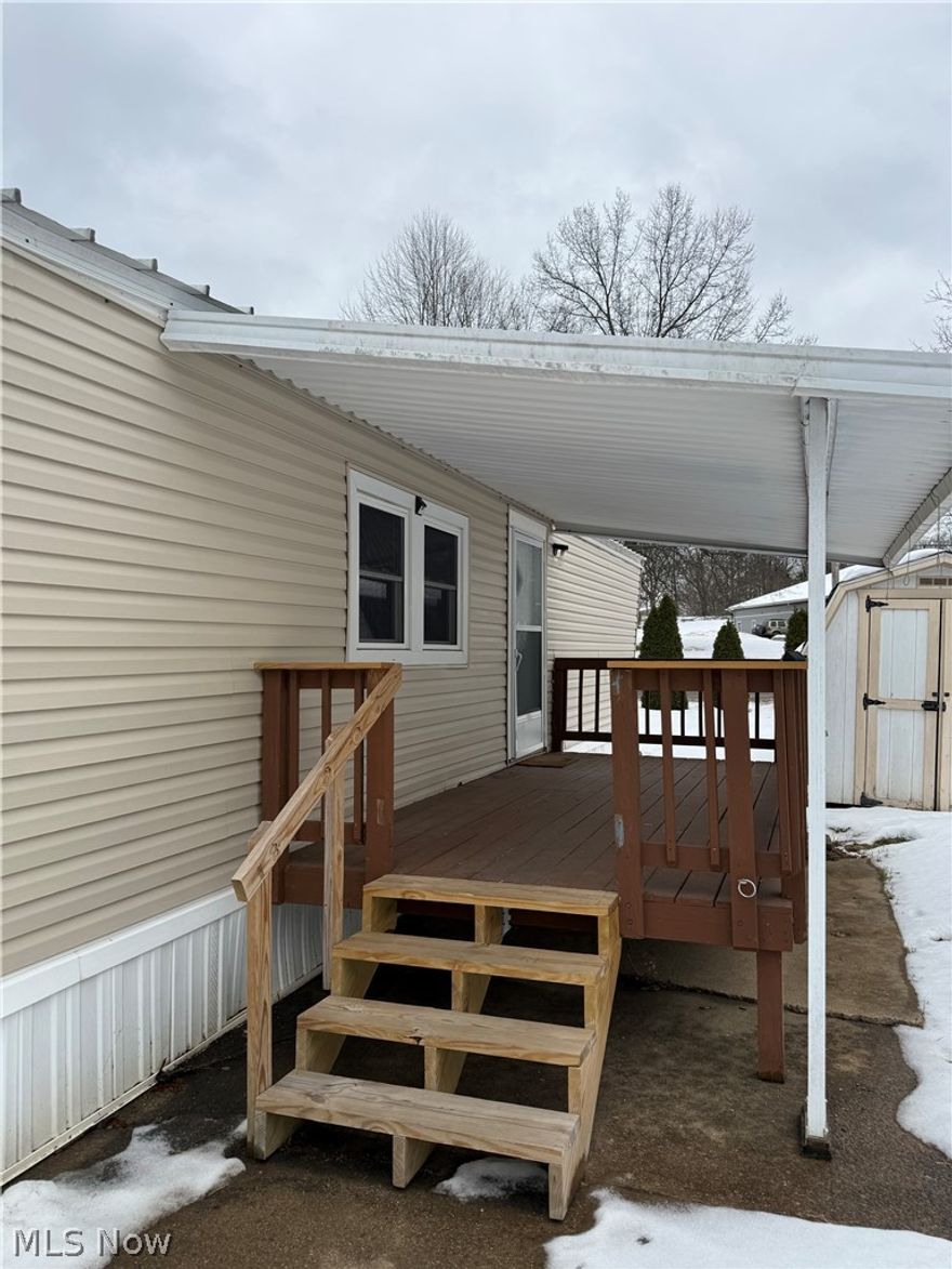 Enjoy easy first-floor living in this beautifully updated 2-bedroom, 1-bath mobile home located in Lake Township, Uniontown—perfect for a first-time buyer or anyone looking to right-size. This home has been updated throughout with fresh paint and new flooring and offers a bright, open floor plan ideal for everyday living and entertaining.

The spacious, updated kitchen features ample cabinet and counter space, room for an eat-in dining area, and includes all appliances. The large living room provides a comfortable space to relax or host guests. The main bedroom offers charming built-ins and a beautiful window—an ideal spot to enjoy your morning coffee. The second bedroom and bathroom have been completely redone, including new subflooring.

You’ll also appreciate the updated bathroom with washer and dryer included. Step outside and unwind on the deck during the spring and summer months. Move-in ready and thoughtfully updated, this home is ready for its next owner to make it their own—welcome home!