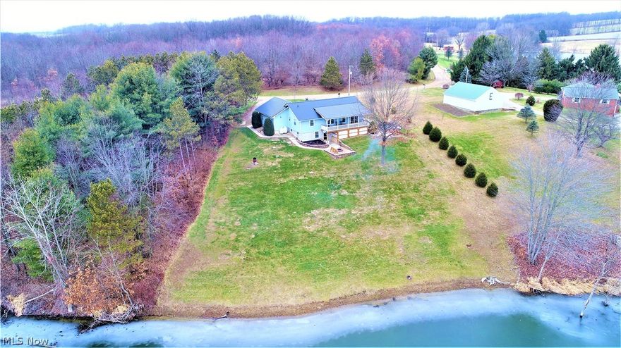 LAKEFRONT HOME GETAWAY. 69 W. Lakeview Dr, Butler. In Northern Knox County, in Amish Country, On 26 Acre Jelloway Lake, just off Mishey Road. 4 BR, 3 Full Bath. Walkout lower level second kitchen/suite. Great Year-Round Living or Weekend Getaway. Half Acre Lot. Enjoy sunrises and gorgeous views of Lake from long, covered rocking chair porch, that is shaded the rest of the day. Walkout lower level to paver patio and fire ring overlooking lake. Virtually free heat from outdoor wood burning boiler unit, or use efficient propane furnace. Central Air. All appliances up and down convey, including 2 washers & dryers. Quite secluded as it’s the last house on the left on a non-thru road. The lake is peaceful with 7hp limit on boats. Canoe, Kayak, Fish from your own front yard. So quiet. So peaceful. 15 min to Krogers in Mt. Vernon; 8 min. to SR3 in Amity; 8 Min to Fredericktown; 7 min to Butler. Close to Mohican Recreational Area. Easy Access to Cleveland, Columbus, etc. Clear Fork Schools.