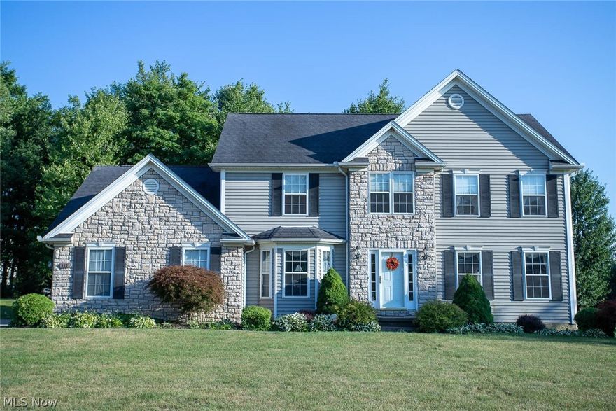 Beautiful 4 Bedroom, 4 Bath home in Macedonia (Thousand Oaks) Eat-in kitchen with island, built in microwave, range, refrigerator, dishwasher and see through gas fireplace that leads into the huge 24x14 family room. Formal living and dining room, also a bonus room in which could be a office, or sitting room as well.  Master bedroom has a spacious bathroom with jacuzzi tub, walk-in closet with built in shoe racks.  On the same floor there are 3 other nice sized bedrooms and a full bath.  The property comes equipped with video monitoring security system in which you can see multiple angles at the same time.  The finished basement has a full bath, plenty of storage, and a home theater area, with theater system which includes: Pull down screen, projector, audio system and 3 recliners chairs for your comfort. Beautiful manicured landscaping with irrigation system built in.  Back yard is a park like setting with shade trees to relax and enjoy the breeze, or entertain and cookout.  Very motiv