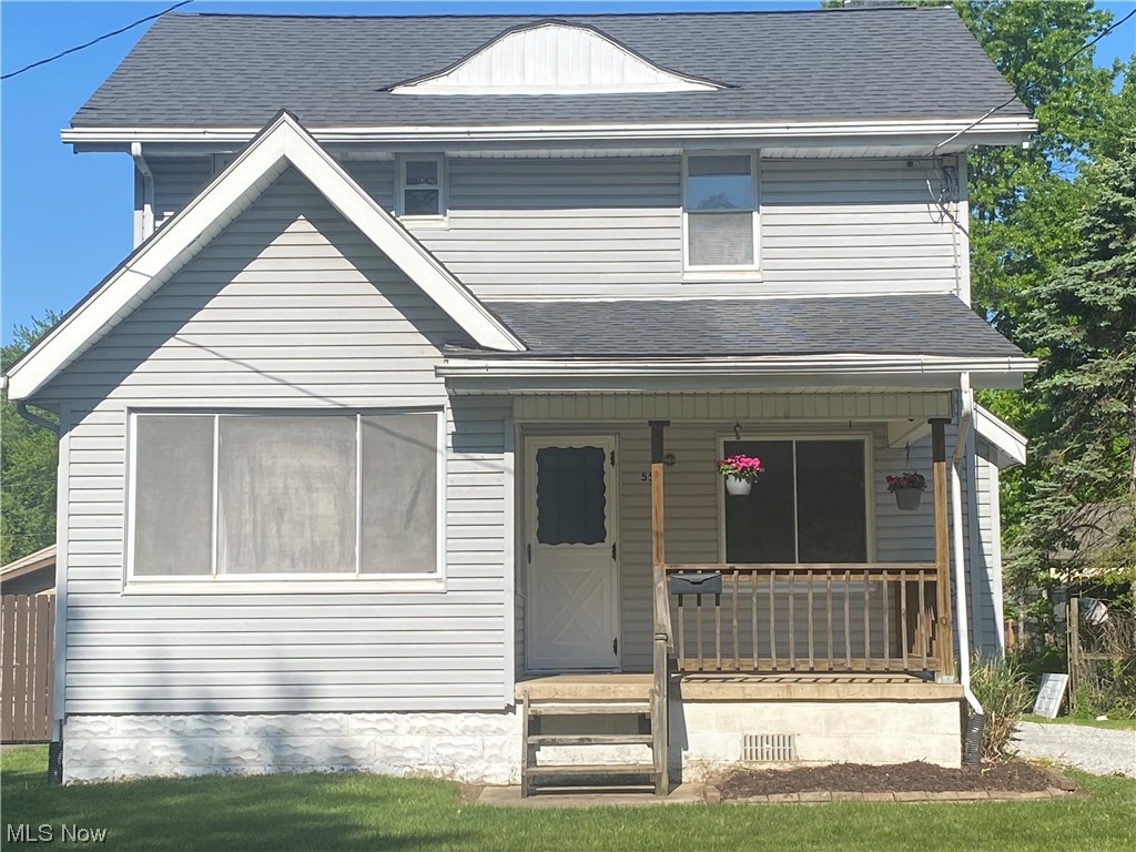 This charming home is move-in ready, super clean, fresh throughout and located on a beautiful street close to Goodyear Hts Metro Park. After work enjoy the relaxing covered concrete front porch (11 x 8 ). A cheerful alcove off living room offers office, reading, toy or craft room options surrounded with large windows. All brick fireplace in roomy living room has a spacious mantle. Brand new waterproof vinyl-plank flooring in kitchen located next to nice dining room with handy built-in china cabinet. Stove is electric with a gas line also available. Bedrooms have large closets. Home has newer central air. Laundry is located in the unfinished basement. Mechanicals appear to be in good condition; however, seller providing 1 year Home Warranty for extra peace of mind. There is a short walk-up insulated attic. The level, mostly fenced, spacious backyard is great for BBQ picnics and various family events. Detached 13 x 21 garage has a concrete floor. A 10' x 9 1/2' concrete pad