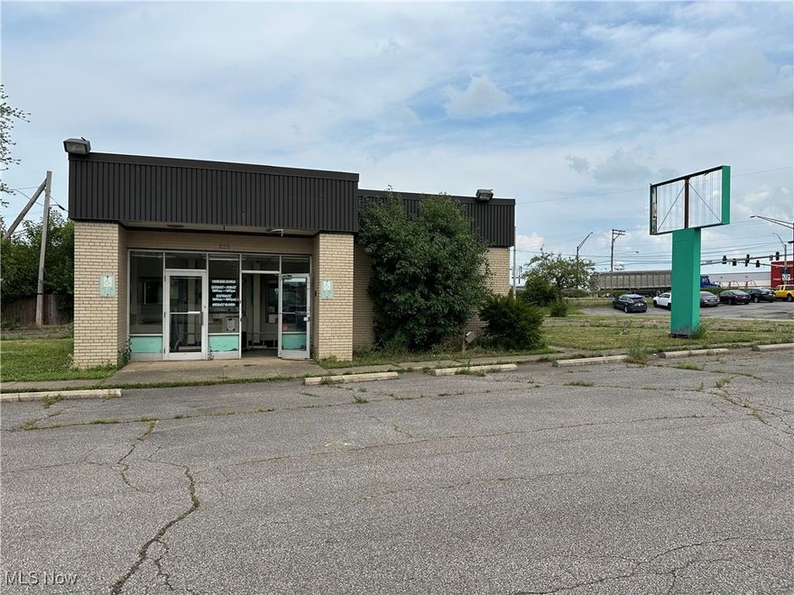 This building was an old bank that currently still has the vault and the drive thru lanes.  The potential for someone is endless including a fast food restaurant, pizza restaurant or any other carry out you can imagine!  High visibility located on the corner of Abbe Rd and Cleveland Rd.  Priced way below market value for you to bring this building back to life!