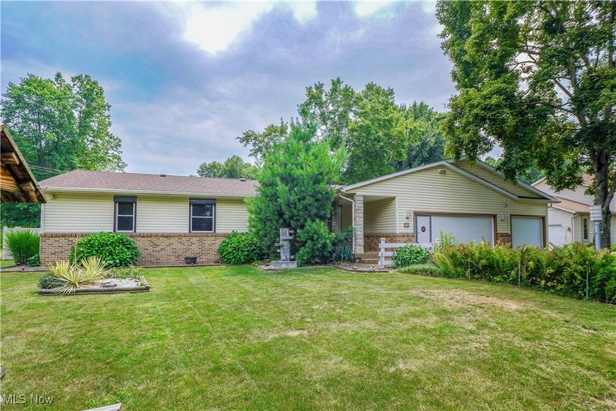Exceptional 3 bedroom ranch in Manchester schools! The bright, inviting layout flows from the living room into the eat-in kitchen, featuring a full suite of appliances and plenty of cabinet space. A cozy fireplace anchors the adjacent family room, where a sliding door opens to a covered patio, great for relaxing or entertaining. Down the hall, you'll find three nice sized bedrooms and a beautifully updated tile bath with a step-in shower, towel warmer, and tiered vanity. The finished lower level adds even more living space with a rec room and recessed lighting. Enjoy the incredible backyard with a fenced area for kids and pets, a gazebo, garden beds, and a large shed. All in a great location near Turkeyfoot Lake and Portage Lakes amenities. Come see it before it's gone!
Owner is a licensed real estate agent-Property is not owned by the listing agent.