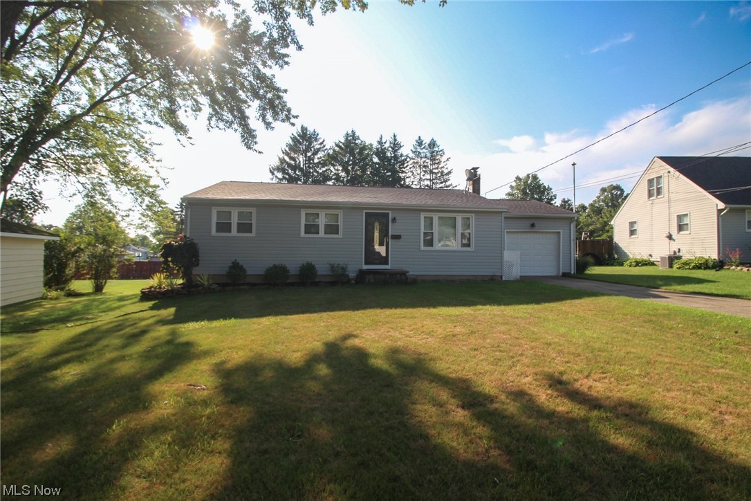 This is a beautifully maintained ranch-style home featuring three bedrooms and two full bathrooms. The original hardwood floors add a touch of classic charm, along with the tray ceilings in the living room and dining room. The home has had several key renovations and replacements within the past decade. The exterior of the home was substantially renovated in 2015, including a new roof, siding, soffits, windows, and downspouts. These updates not only enhance the home's curb appeal but also provide weather resistance and improved energy efficiency. A/C and Furnace are approximately 10 years old and the HWT is 2021. Electric was updated in 2017. The basement is home to the second full bathroom and there is a side room for storage or for a workshop room. One of the standout features of the property is the LARGE backyard, offering plenty of space for outdoor activities, gardening, pets, or even a future expansion or additional outdoor structures. This home combines traditional charm with up