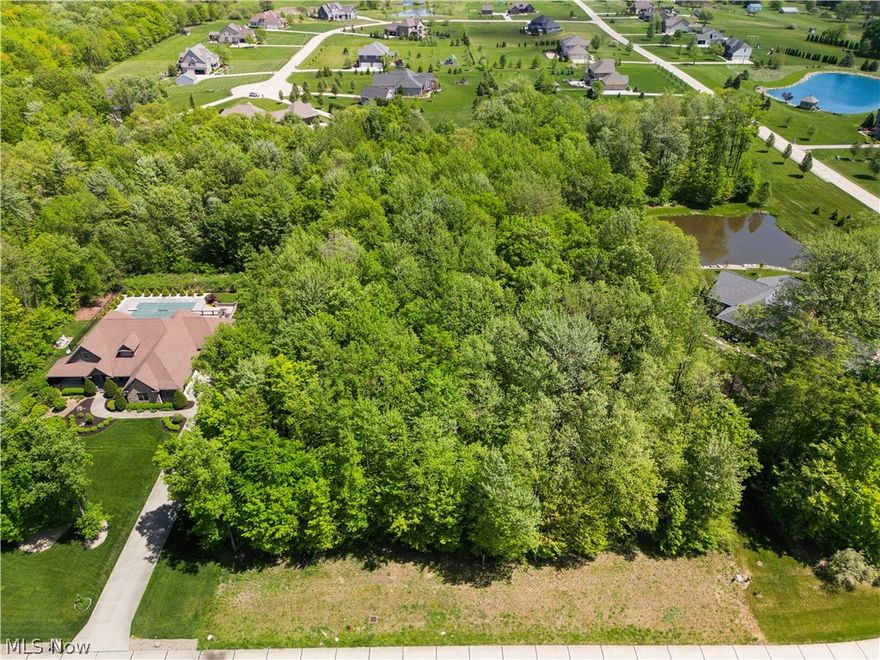 Here is the perfect level lot to build your dream home.  This wood treed 2 acre lot is truly a  gem and is on the cul-de-sac.  204' foot frontage,  Bring your builder!