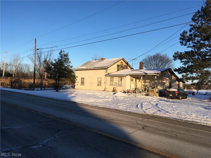 This home needs a complete overhaul !  Large 1 acre lot * City water available at the road * Large pole barn *  Close to shopping and medical * Home being sold "As Is".