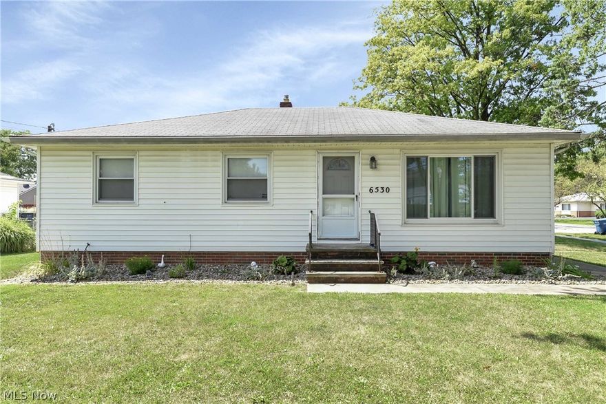 Rare Opportunity To Own A Ranch Home With Attached FULL Additional Living Suite, Situated On An Oversized Corner Lot!! The Main Home Offers Three Bedrooms, All With Well-Kept Natural Hardwood Flooring.  Centrally Located To The Bedrooms Is A Large Full Bathroom With Updated Vanity And Tile Floor.  The Kitchen Is Open To The Dining Room, And Offers Much Cabinets And Counter Space, As Well As Double Ovens, Refinished Cabinets, And Updated Flooring. Finishing Off The Main Floor Of The Home Is A Spacious Family Room With Large Slider Windows, Allowing For Much Natural Light To Fill The Space.  The Aforementioned Additional Living Suite, Or In-Law Suite, Is Easily Accessed Through A Door Off Of The Main Home Dining Room, And Also Has It’s Own Exterior Entrance.  This Space Features An Additional Bedroom, Another Full Bathroom (Which is Fully Handicap Accessible), Large Family Room And Dining Area, Kitchen With Appliances, And Washer/Dryer. The Exterior Consists Of A Private, Fenced-In Backy