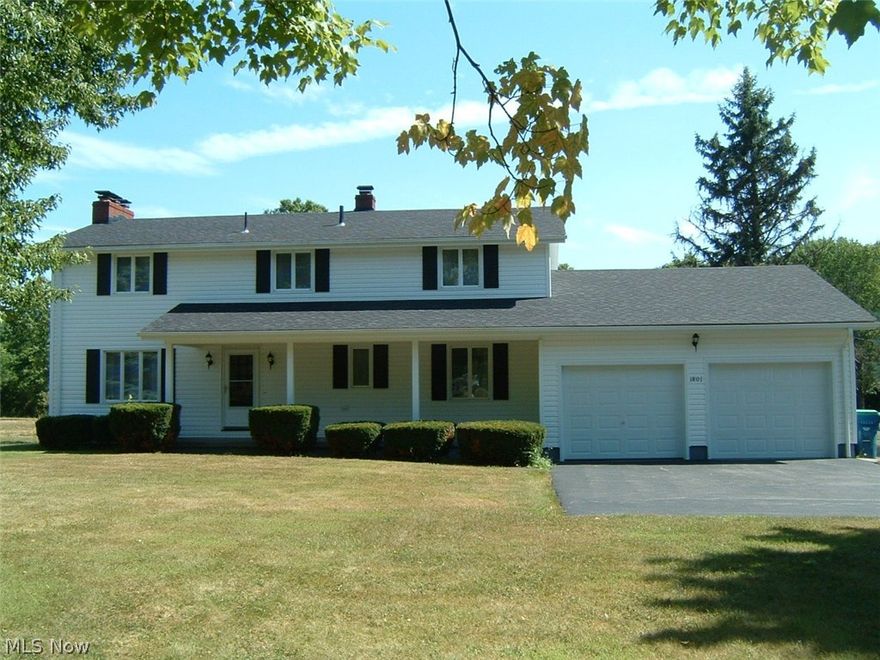 One owner, custom-built, 4BR, 2 1/2BA Colonial with detailed trim work. 3.96 Acres, L-shaped, irregular lot. Rear of the lot abuts Churchill Park. Hardwood floors on the second floor. Newer roof, vinyl siding, downspouts and garage door (2015). Higher-efficiency furnace and central A/C (2008). Over 2500 sq.ft. Thermopane windows with screens. Roofed, rear, screened-in porch. Attached double garage. Full basement with L-shaped area suitable for finishing as a Rec room. Separate 12x13 room in basement could be BR/Office/Exercise room. 150 amp electric service. Washer and dryer are included. Shower only in the basement with available plumbing for commode and sink. Plenty of storage cabinets, shelves and closet space in the basement. Front porch. Entry Foyer with double guest closet. Powder room. Large LR with fireplace. Formal DR. Kitchen with all appliances, stained Birch wood cabinets, dinette area and pantry. Mud room could be converted to a first floor laundry area. Two first floor se