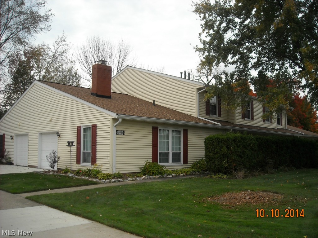 This maintenance free, well- cared for condo has been freshly painted throughout and is ready for you to move in. First floor features galley kitchen with laminate wood floors and pass through counter with space for bar stools. Generous size living room with built-in book case. Dining room has sliding glass doors leading to patio. Family room has a wood burning fireplace, could be first floor master suite with full bath. The second level has a full bath and two spacious bedrooms with ceiling fans, master has walk-in closet. The attached one car garage has additional storage space and a pull down ladder for easy access. Improvements include newer vinyl siding and roof in 2011. There is an in-ground community pool tennis court and party house. Easy to show!