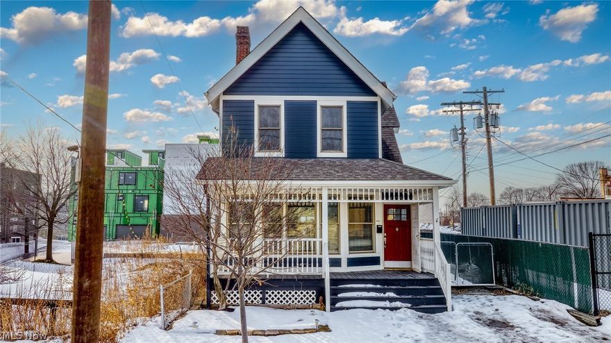 Exceptional Ohio City home with dramatic ceiling height in the sought-after Clinton Ave neighborhood. Thoughtfully renovated with entertaining in mind, this residence is defined by light-filled, open spaces and architectural impact throughout. The welcoming front porch offers a front row seat to the vibrant energy of the Clinton/Franklin corridor, an area that continues to evolve and thrive year after year. Inside, a striking 2-story living room steals the show with soaring ceilings, expansive windows, and an electric fireplace. Hardwood floors span every level, complemented by a mix of updates that create an inviting atmosphere. The kitchen is stylish and functional, featuring maple cabinetry, stainless steel appliances, granite countertops and tile backsplash and flooring. It flows seamlessly into the living areas for effortless entertaining. A versatile rear family room offers flexible use as a home office, playroom, or rec space, with sliding doors leading to a large outside deck with built-in seating and a fully fenced backyard. Upstairs, the expansive primary suite impresses with vaulted ceilings, a wall of windows, skylights, a walk-in closet, and modern ensuite bath with dual glass vessel sinks and a tiled tub/shower combo. The 2nd bedroom is equally spacious with vaulted ceilings, dual closets, and a recently updated ensuite bath with skylight. Additional highlights include an oversized 2nd-floor laundry room, a 1st-floor half bath, detached garage and a basement waterproofed by Ohio State Waterproofing with an up-to-date, transferable lifetime warranty. Ideally positioned between the Gordon Square Arts District, Hingetown, and the W. 25th Street Market District, this home offers exceptional access to some of Cleveland’s best dining, entertainment, and urban amenities. Just two blocks from Cleveland Metroparks trailheads, enjoy direct access to Edgewater Beach, the Towpath Trail, and a quick Route 2 on-ramp for an easy one-exit commute to Downtown.