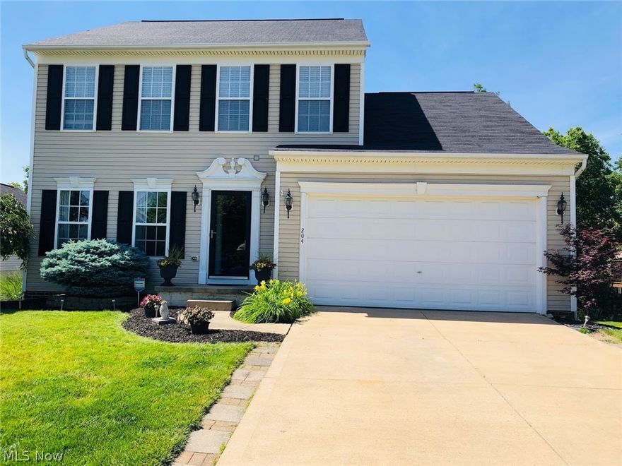 Liberty Greens open concept home ready for its new owners. 3 bed, 3 bath and over 2,500 sq ft of living space. You will notice this home has been meticulously cared for. As you enter you will notice vaulted ceilings and gorgeous wood flooring from the entrance throughout the spacious kitchen. On the second floor large master bedroom with full updated bath. Two additional bedrooms on the second floor with additional full bath. Basement is also a must see. Partially finished walkout with patio. Enjoy your summer nights entertaining guests on your deck with slide out from the Kitchen. This home provides a home warranty. Close to shopping, schools and freeway. Schedule your private showing today