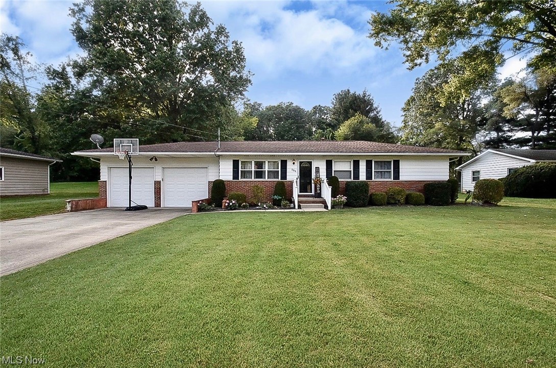This move-in ready ranch in Green Local Schools is waiting for you! The beautiful eat-in kitchen, spacious (just under an acre) fenced in backyard and partially finished basement with a built in bar are perfect for entertaining friends or creating a great night in. This home is conveniently located to stores, shopping, and I-77. Schedule your visit today!