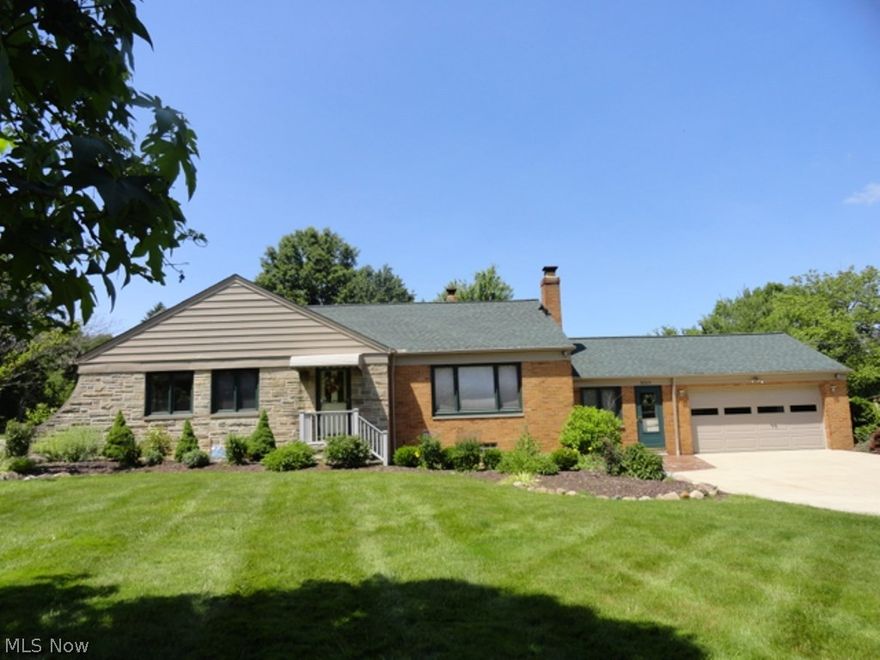 Updated, all brick ranch nestled on 1.6 acres.  This home offers 3 bedrooms and 2-½ Baths.  A vaulted master bedroom and bath were tastefully added in the 90’s, along with a small sunroom area off the kitchen. The formal living room/dining room offers a gas fireplace and neutral décor. The eat-in kitchen has ceramic flooring and all appliances will stay. The lower level has a knotty pine rec room w/ bar and wood burning fireplace. There is a large dormer room on the second floor that could be used for a small child’s room or storage. The two car attached garage has a door that opens to the huge back yard. There is a spacious patio and a large deck. The roof was replaced in 2012. Furnace and A/C replaced in December of 2013.  A must see home!