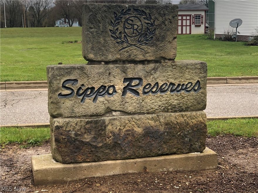Tri-Doc Buildable Lot on Sippo Resreves Drive. Across from Tuslaw High School. Tuslaw Schools. Meet the Builder and see the GREAT home he can build for you.