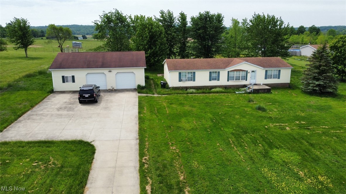 Estate Auction. 1992 One-Story Doublewide Home With 1,680 Sq. Ft., Three Bedrooms, Two Baths, 32 X 40 Pole Barn Garage & Shop, Concrete Drive, All On 3.52 Acres of Land. Knox Twp., WBLS. Live Onsite with Online Bidding Available on Real Estate Only. To settle the Teddy Lee Jones Estate, Columbiana Co. Case #2025ES00062, all sells on location. ONLINE AND LIVE ON-SITE BIDDING WILL BEGIN TUESDAY, JULY 1, 2025, 4:30 PM, REAL ESTATE SELLS AT 5:00 PM. Real Estate. 1,680 sq. ft. ranch style home with three bedrooms, two baths, oak kitchen with appliances, cathedral ceilings, brick foundation, FA, LP gas, and central air. Drilled well and septic. Nice setback with concrete drive. 2003 32 X 40 pole barn, vinyl siding, two overhead doors, and concrete. Nice setting. Shown by appointment or open on auction day, 2 hours before.