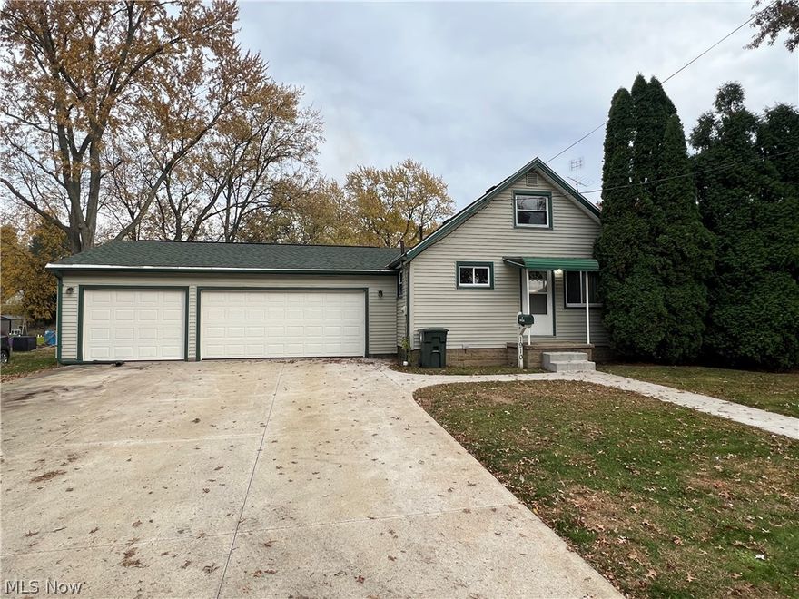 2 bedroom bungalow has tons of potential and priced to sell!  The amazing, newer constructed 32x26 3 car garage has automatic openers, electric, and plenty of room for work benches and storage!  Concrete walk ways and driveway were also poured at that time.  The double lot offers a huge back yard perfect for play or entertaining!  Big ticket items have been done such as a newer furnace and central air, updated electrical breakers, vinyl siding, and some newer windows.  Add your finishing touches for the perfect home or investment!