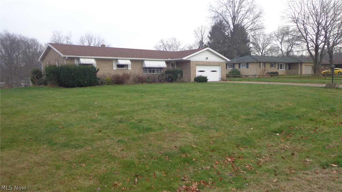 This is an Estate Sale and being sold as is. All offers will be sent to the Estate Attorney for approval. Although this brick house can use some updating the core of the house is great with a tons of space in the full basement. The roof is newer within the last 10 years and furnace/ac/hot water were possibly within that same time frame, in working order before the electric, water, and gas were shut off. It sits on almost a half acre and has backyard views of one of the canals that lead into Turkey Foot Lake. Hardwood floors are present under the carpeting on the first floor too. The 2 car garage has hot/cold water outlets and a heater too. Surrounded by well kept houses and higher market values on the street, this is priced at average tax value with wiggle room for updating.