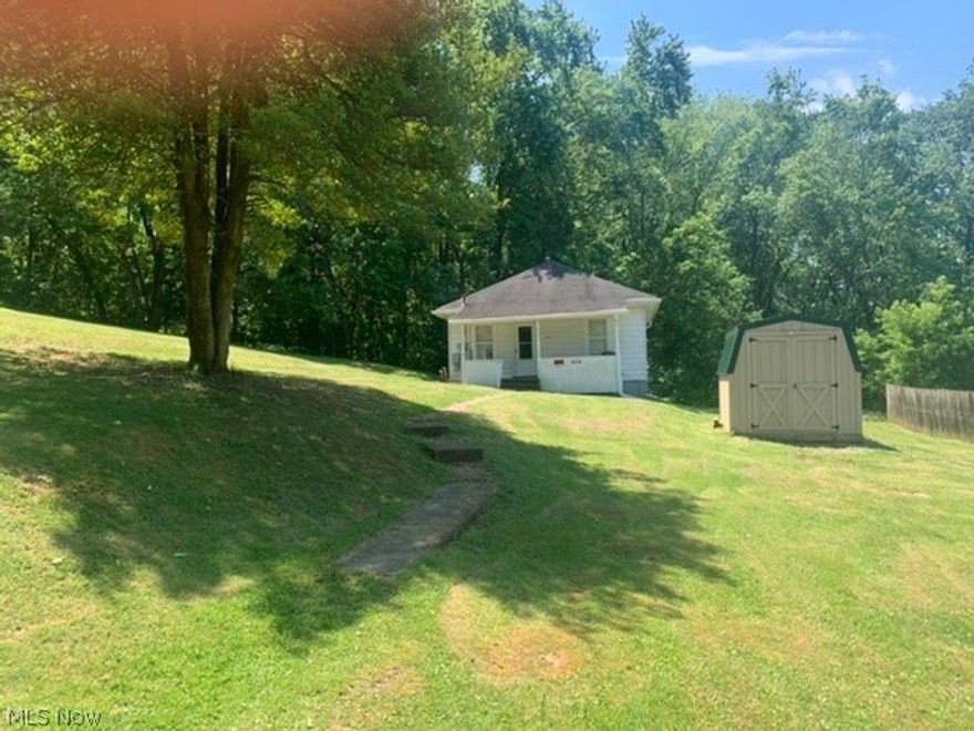 This small bungalow style home is situated on a dead end street with a large lot. There is plenty of parking in front. The home offers 2 bedrooms, living room, kitchen, laundry and 1 full bath. The home has been updated with new gutters/guards, new carpet, new lighting. This home would make a really great investment or starter home.