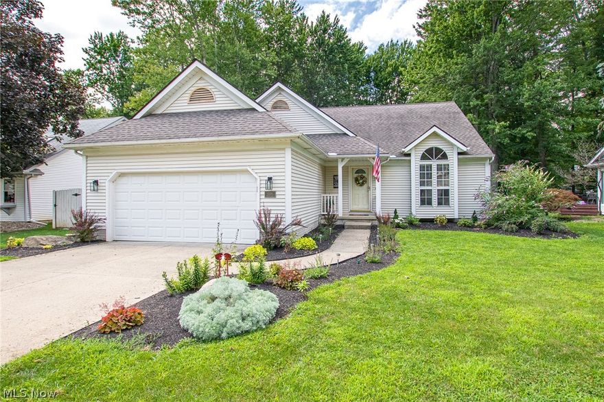 Welcome home to this completely updated 4 Bedroom and 3 Full Bath Custom Built 4-Level Split on a quiet cul-de-sac street in North Ridgeville.  The home is much larger than it appears with over 2,500 square feet of above ground living space plus an additional 721 square feet of finished basement.  The home features a huge remodeled kitchen with white cabinets, plenty of counter space, mosaic tile back-splash, a large breakfast island with seating, a coffee bar station, and plenty of storage.  LED recessed lighting has been added to the vaulted ceilings and newer luxury vinyl tile runs throughout the kitchen and large dining area.  The upper level features the Master Suite with walk-in closets and a Master Bath with a jetted tub, separate shower, dual vanity and heated floor.  The upstairs is complete with 2 additional bedrooms and full bath. On the lower level, the large Family Room is the perfect place to relax by the lovely stone fireplace with a gas insert.  Completing the lower lev