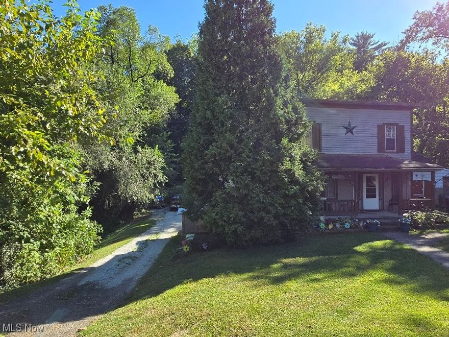 Bring OFFERS!!   Very Nice 2 Story nestled away in a country setting.  Nice secluded deck in the rear.  Priced to sell.  Bring all offers. Has a new roof on main side of home.  Upstairs bedroom just needs cosmetic finishing.  Come and see the potential of this Big Beautiful Home Today.