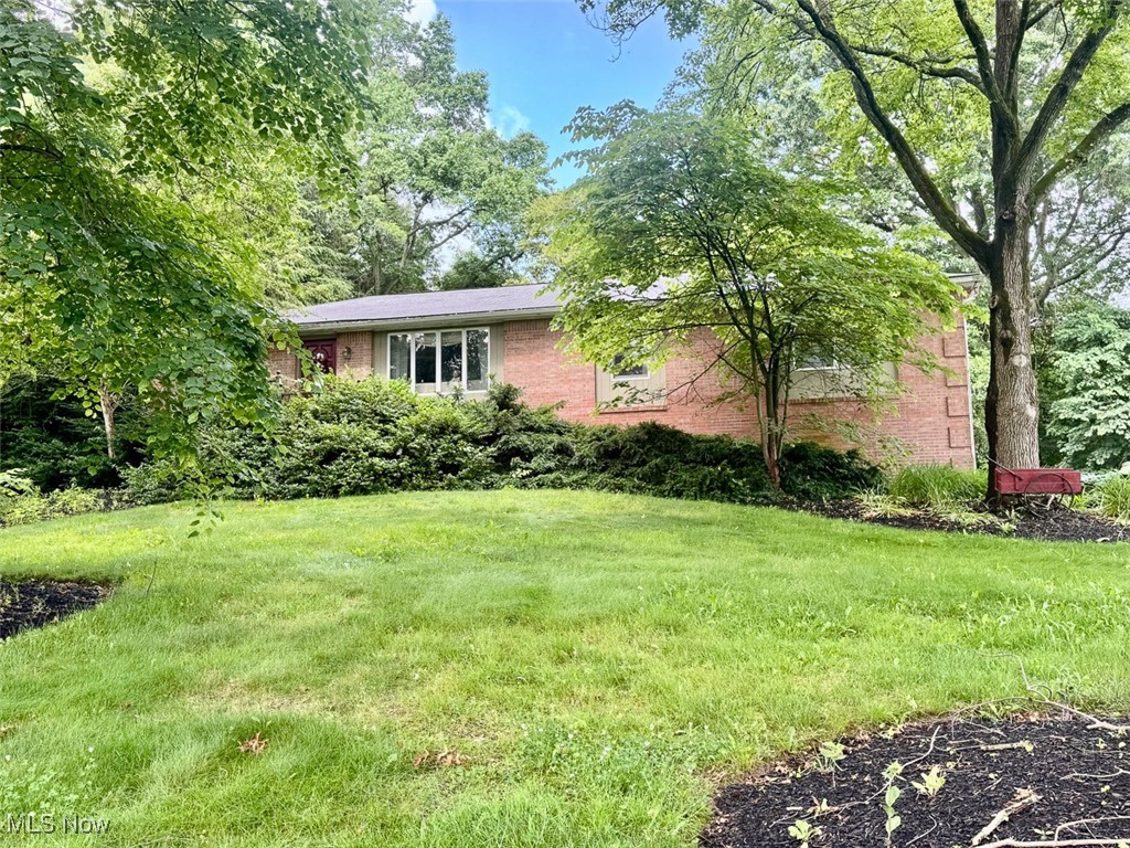 Brick Ranch Home On .5 Acre. 3 Bedrooms, 3 Full Baths, 2-Car Garage. Stark County, Jackson Twp., Jackson Schools. Onsite and Online Bidding Available on Real Estate. After 52 years, owners are downsizing! ABSOLUTE AUCTION, all sells to the highest bidders on location. ONLINE BIDDING BEGINS TUESDAY, JULY 15, 2025, at 12:00 PM, and AUCTION LIVE ON-SITE BIDDING WILL BEGIN FRIDAY, JULY 18, 2025, at 12:00 PM. Stark County parcel #1603986. Nice brick ranch home situated on a .5-acre wooded lot. Beautiful, quiet neighborhood in a convenient location. Main level has kitchen with tile floors and Corian countertops, a formal dining room, family room with wood burning fireplace and sliding doors leading to the rear enclosed three-seasons room, an additional living room, a full bath, and three bedrooms (one bedroom has private master bath). The lower level has storage/utility rooms, a full bath, a laundry area, an updated breaker electric box, a gas FA furnace with A/C, and a two-car attached garage that leads out to the asphalt driveway. The home was built in 1972 and has approx. 1,708 SF and the real estate half-year taxes are $1,815.55. Great property with loads of potential, does need some minor primping and updating to your taste. Don’t miss out! The home will be open on auction day, starting at 9:00 AM for inspections.