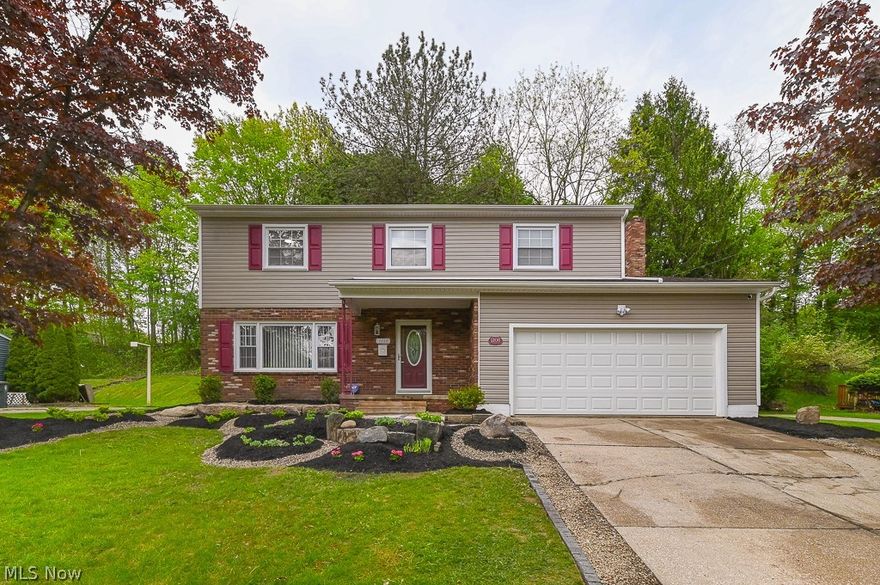 Every square foot is maximized with this move in ready colonial in the highly sought out 44313 area ; the ideal home for the growing family.. This 4-bedroom home offers space, natural hard wood flooring throughout, flexibility and comfort. Entering your new home, you are met with a foyer leading to your formal living room. This space is great for guests to gather as a conversation space. Travel further down the hall and you will discover the entry to your chef’s kitchen! The kitchen accommodates sleek countertops, all new stainless steel appliances as well as a large kitchen island. One of the most exclusive options this floor plan offers is the spacious family room that sits off the kitchen area. The family room is equipped with a stone, wood burning fireplace as well as a half bath for guests to use.  Talk about the perfect space for family and friends to gather!  Roam up the stairs to the second floor which is filled with four bedrooms. This level has your private master suite with an elegant master bathroom. The master bathroom holds marble countertops, a standup shower and LED lighting throughout. The walk in closet is expansive! Perfect for his/her sides! The other 3 bedrooms are nice sized with the perfect closet space and a full bath. Last but not least, on the lower level is your spacious finished basement. This extra living space is perfect for a man cave, den, rec room or play room! You will never have to sacrifice your space or comfort. There is something for the entire family to enjoy!