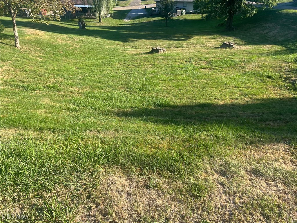 Looking to build? Here is a reasonable priced lot. This is a corner lot on Taylor, but can also be accessed from the street below, so the home could face several directions. Seller has had home plans approved by the city. Lot is just minutes to I70.