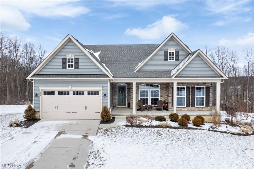 Nestled in the most peaceful setting, this nature lover's paradise offers incredible views and wildlife visitors. As you enter, the flowing, open floorplan greets you. There is an ideal office space with a large window, which could also be a dining room. The luxurious great room showcases a coffered ceiling and wall of windows, which provides ample natural light and breathtaking views. The gourmet kitchen boasts a center island/breakfast bar, stainless steel appliances, extensive cabinetry, and a large eating area. The first-floor laundry room adds practicality to the seamless design. The elegant owner's suite features a tray ceiling, walk-in closet, and ensuite bathroom with dual vanities. The additional, generous-sized bedroom and main full bathroom complete the main level. Downstairs, you'll find a finished, walk-out basement with a large recreation area/family room and a full bathroom - it offers endless possibilities! The spacious deck overlooks the patio, fenced-in backyard, and breathtaking views of the Cuyahoga Valley Park. Situated on a sprawling .39-acre yard in the esteemed Woodridge school district, this residence offers both serenity and convenient location. Bright and airy, this home is a harmonious blend of comfort and elegance, providing a haven for those seeking a balanced lifestyle. Don't miss the chance to call this retreat your home.