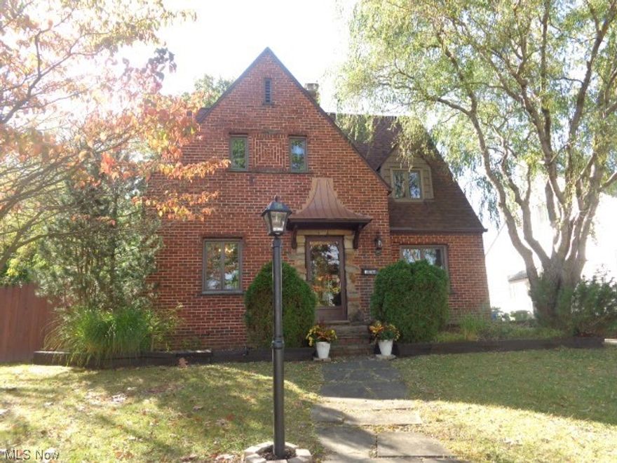 Beautiful All Brick Tudor Colonial With Lots Of Character And Charm On Desirable Street!! Steps to The Metroparks!! Home Features Newer Wood Flooring And Natural Woodwork Throughout!! Anderson Wood Windows!! Second Floor Screened Patio Off Bedroom!! Fireplaces In Master Bedroom And Living Room!! Walk Up 3rd Floor Attic!! Glass Block Basement Windows!! Updates Include Newer Roof,Vinyl Cedar Shake Siding,Leaf Proof Gutters,and New Concrete Driveway In 2019!! New Garage Door July 2023!! Fully fenced Private Yard!! Owner Relocating!! Home Being Sold "AS IS"!! Dont Miss Out!!