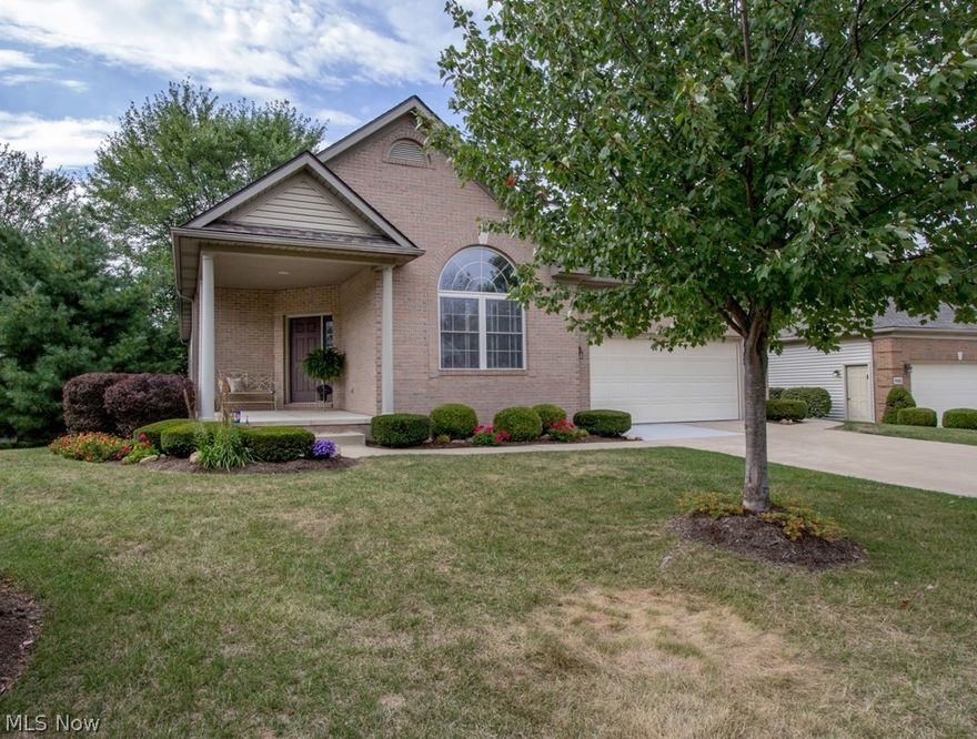 This stunning free standing villa is complete with 3 bedrooms, 3 full bathrooms and over 3700 square feet of gracious living. Located in the heart of North Canton in the beautiful St. Ives allotment- this home is located near restaurants, shopping & the interstate. This ranch home has a two car heated garage, a screened in porch off of the dinette with additional maintenance free decking with views of the beautiful pond. Most of the main floor showcases hardwood floors through the open concept design. The office is located at the front of the home with a double door entrance and extensive windows. The dining room opens up into the great room which features vaulted ceilings and a corner gas fireplace with a stone front. The kitchen has solid surface counter tops, a tiled back splash, bar and kitchenette spaces, pantry and Kitchen Aide stainless steel appliances. The first floor laundry room has a utility sink and built in cabinetry. The master suite contains vaulted ceilings with a full