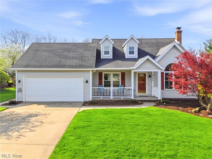 Absolutely stunning, meticulously maintained 3-bedroom, 2.5-bath home located in the highly sought-after Meadowood neighborhood in Twinsburg. A welcoming front porch sets the stage as you step inside to the striking architectural ceiling details that deliver an immediate “wow” moment and a lasting first impression. The spacious two-story great room features a gas fireplace and abundant natural light, flowing seamlessly into the large kitchen perfect for both everyday living and entertaining.  The kitchen offers ample cabinet and counter space along with updated light fixtures. Sliding glass doors lead to a generous private deck overlooking a beautifully maintained backyard perfect for entertaining, relaxing, or hosting summer gatherings. It features plenty of space for outdoor dining, play, and enjoying the fire pit while offering a peaceful retreat. A formal dining room, open to the foyer, provides an ideal setting for gatherings and holidays. The highly sought-after FIRST FLOOR primary suite is generously sized and includes a walk-in closet, en-suite bath, and peaceful views of the backyard. A beautifully updated first-floor laundry area adds convenience and style. Upstairs, you’ll find two additional bedrooms with large closets and a full bathroom. The finished lower level offers additional living space with endless possibilities, along with ample storage. Newer Furnace, A/C, and Hot Water 
Tank (2024). This gorgeous one-of-a-kind home is located on a quiet street with limited traffic flow and convenient access to a neighborhood playground, local schools, library, water park, and major highways. Your next chapter begins here. Schedule your showing today before this beauty is gone!