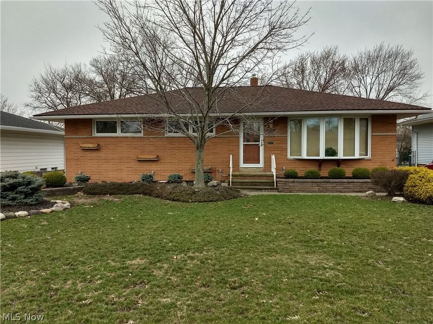 You'll love this house! Endless possibilities here! Charming Brick ranch with three bedrooms, one full bath and half bath along with a stand up shower in the finished basement.  Huge bay window in the living room allowing extra sun light, separate dinning room, & nicely sized kitchen with super cute built in table & bench seating. All three bedrooms are very spacious and have nicely sized windows. Enjoy your summer nights in the "4 season" spacious enclosed back porch. Fully finished basement with kitchenette, family room, laundry room, extra storage area, stand up shower, & built in cabinets. All of this plus there's a deck, shed, built in gas grill, and two car garage that comes with refrigerator, built-in cabinets for a possible workshop, ceiling fan, & electric door opener. WOW! Great family neighborhood with park & playground down the street and close to all conveniences. This house is truly special! Call today to request a showing!!