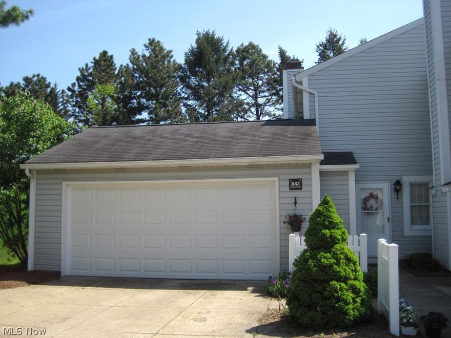 Wonderful, two bedroom condo in Eagles Chase offers maintenance-free living.  Living room with gas fireplace and mounted TV.  Kitchen with newer stove, peninsula bar, and all appliances.  Dining area offers sliders to private, fenced in, brick patio.  Master bedroom boasts walk-in closet and dressing table.  Guest bedroom features double closets and wall of built-ins.  Laundry closet with cabinetry and sink.  Two car garage with built-ins.  Recreation includes swimming pool and tennis courts.  Conveniently located and close to Naturealm.